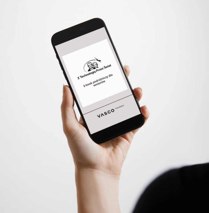 Dłoń trzymająca telefon.